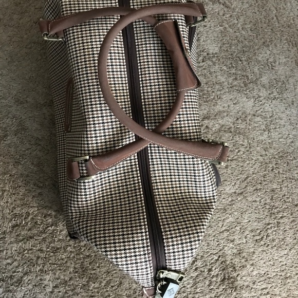 diane von furstenberg rolling duffel